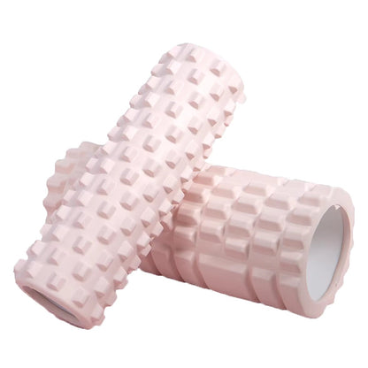 Xlyft light pink 33cm foam yoga massage roller with a textured grid surface for muscle recovery and back training