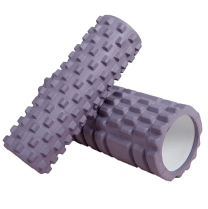 Xlyft purple foam yoga massage roller with a textured grid surface for deep tissue muscle recovery and back training